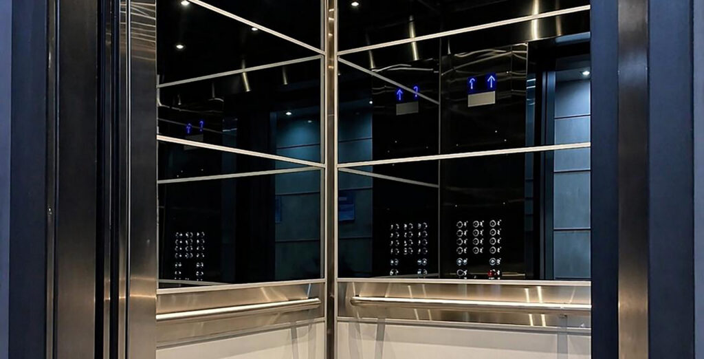 Elevator inside with elevator mirror glass by Raw Glass