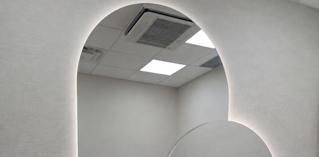 Raw Glass cut arched double mirror in mirror set, installed in Ottawa dental clinic