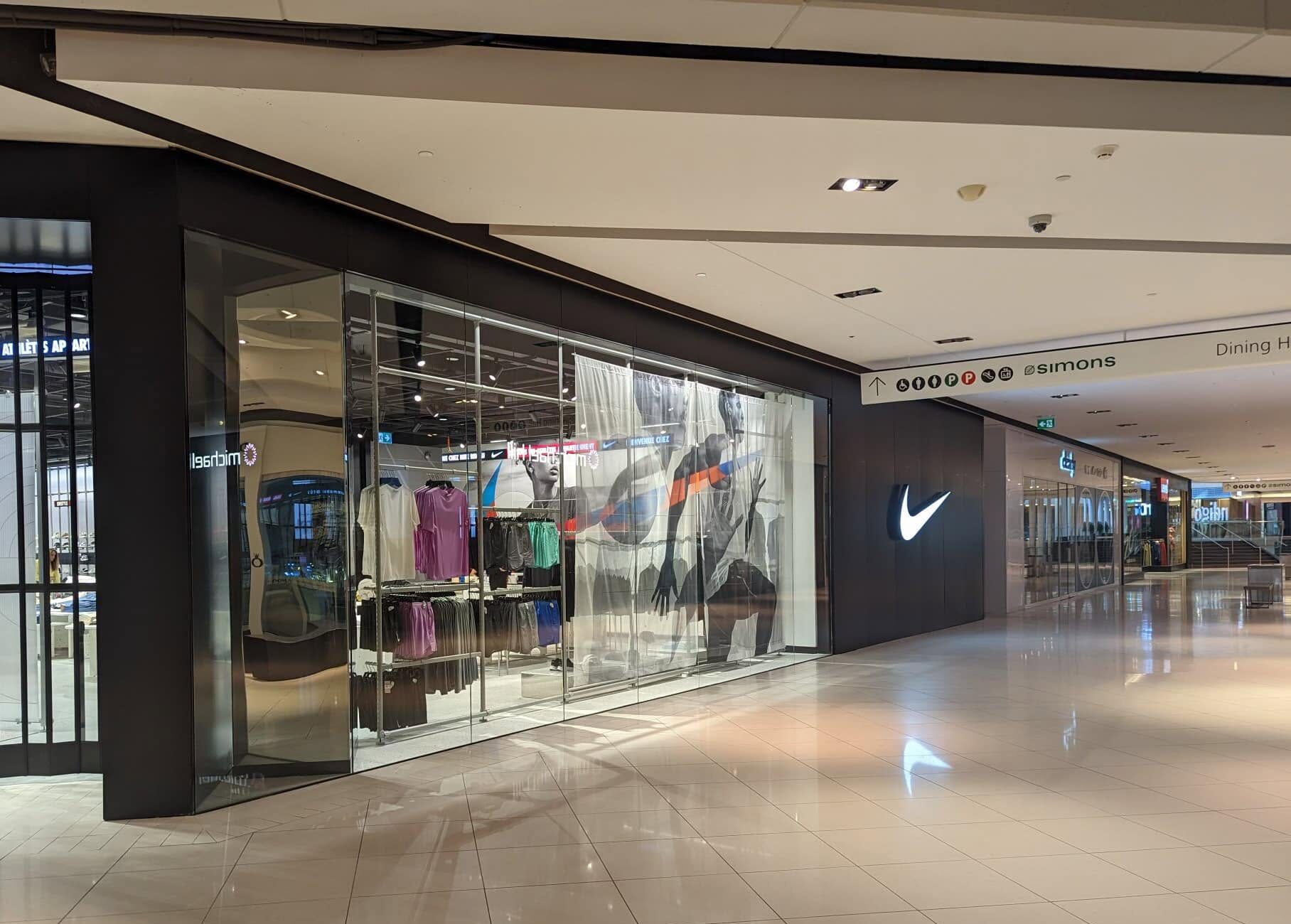 Nike glass storefront in Rideau Centre in Ottawa, installed by Raw Glass