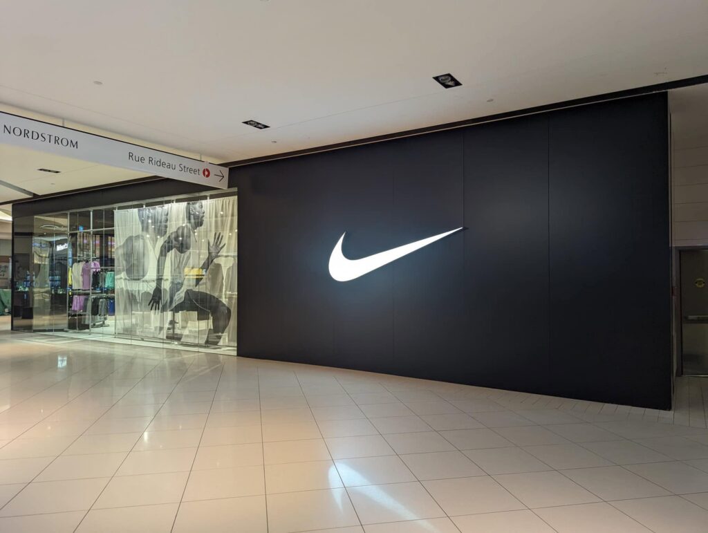 Nike glass storefront in Rideau Centre in Ottawa, installed by Raw Glass